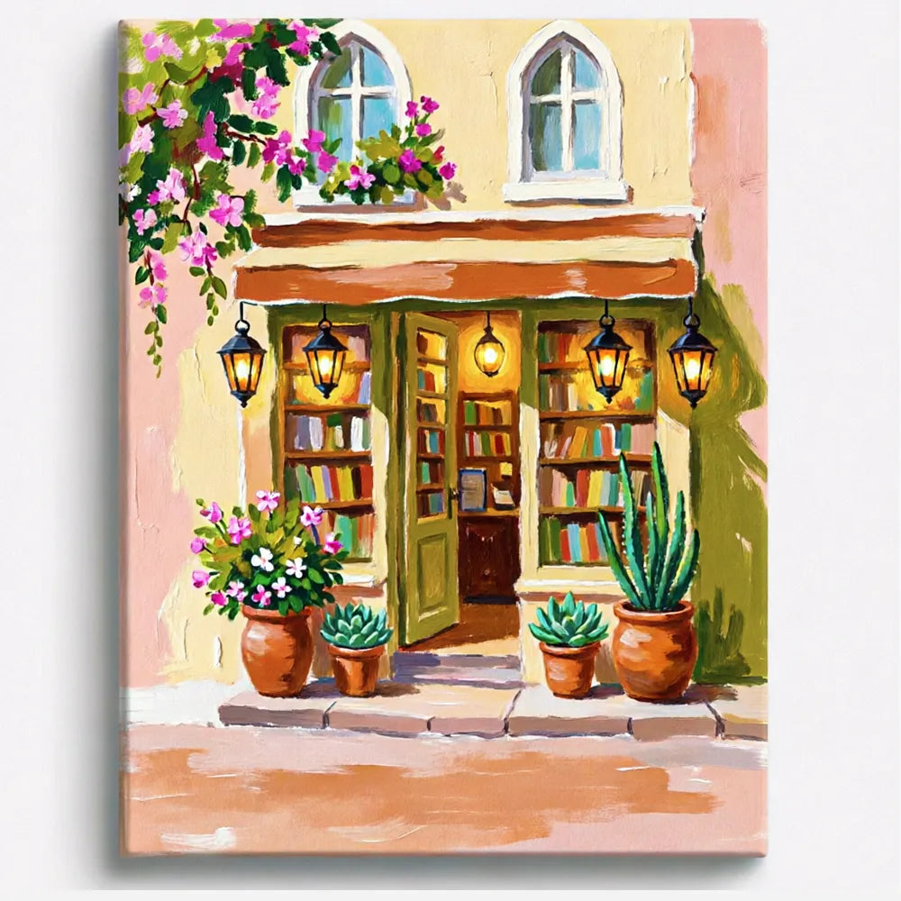 Malen nach Zahlen für Erwachsene Motiv mit gemütlicher Buchhandlung, blühenden Pflanzen und Laternen vor gelber Fassade