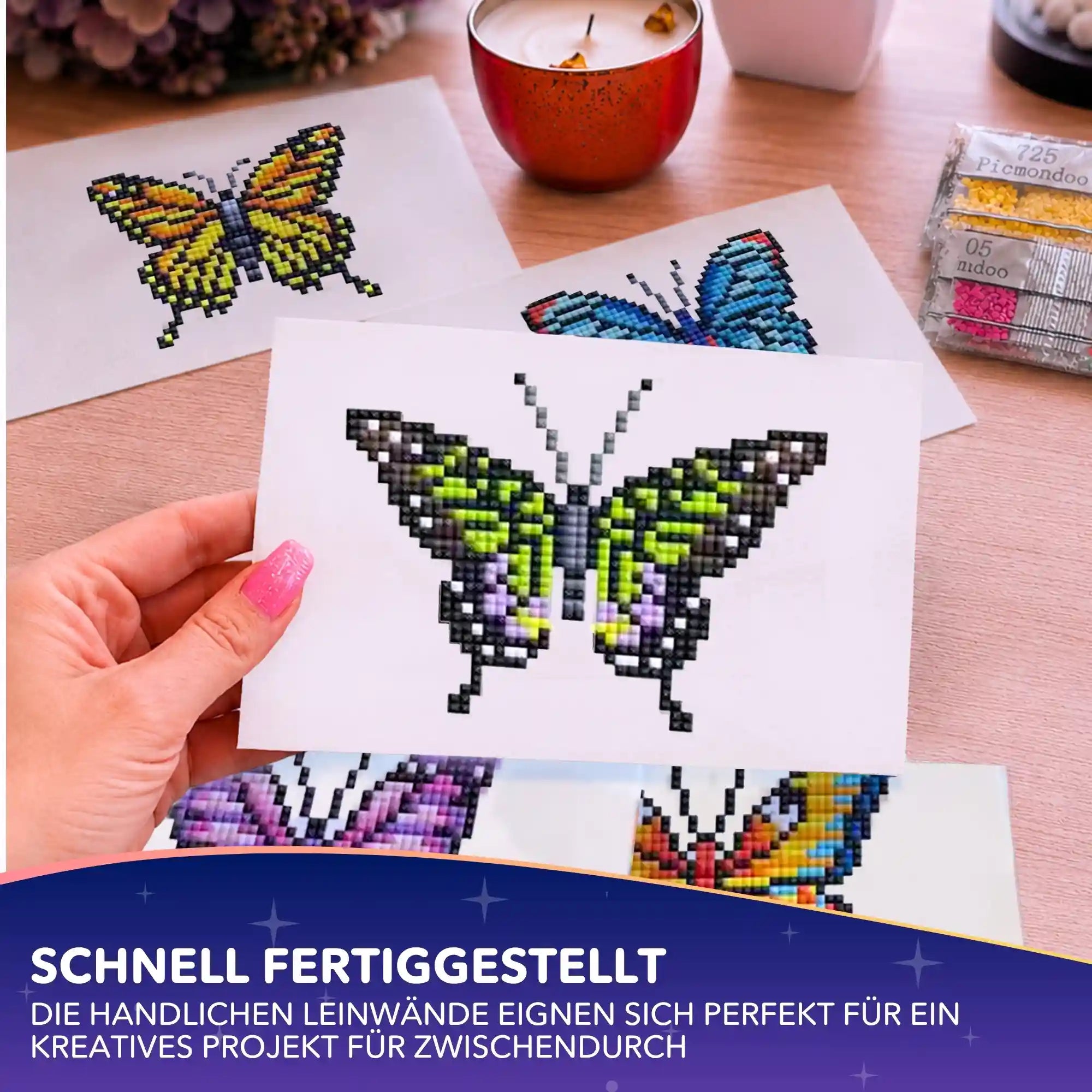 Diamond Painting Mini Set mit bunten Schmetterlings-Motiven auf kleinen Leinwänden für kreative DIY-Bastelprojekte.